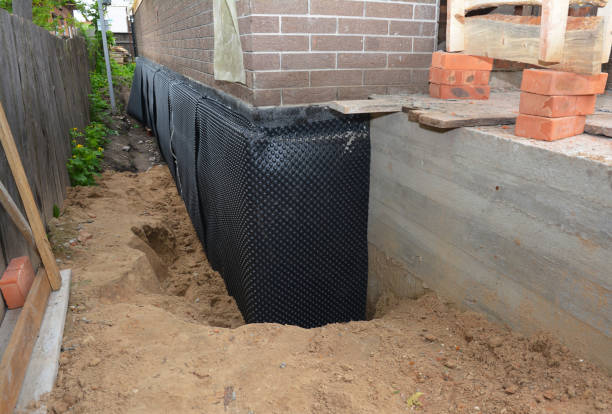 SJ Waterproofing Pros technician performing targeted Foundation Crack Repair assessment in Rosendale, WI